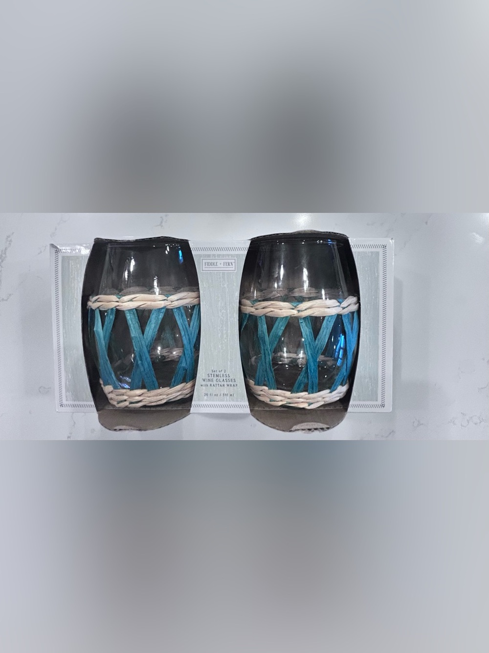 NIB- FIDDLE AND FERN STEMLESS WINE GLASSES WITH RATAN SLEEVE, SET OF 2